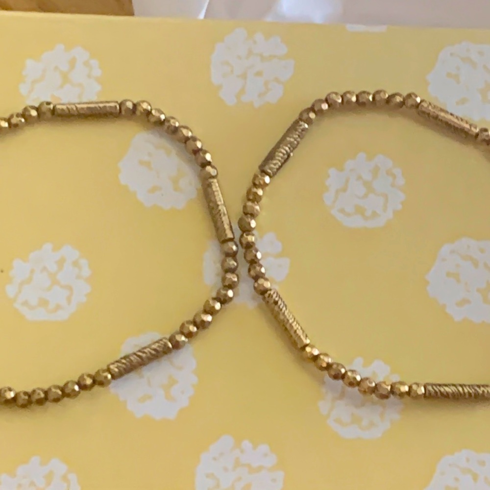 Bracelet set, gold in color, gently used. Very stretchy, will fit all wrists.